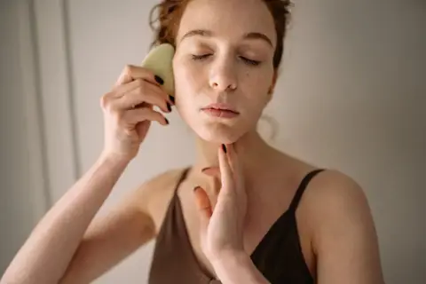 Everything You Need to Know About How To Use a Gua Sha Tool